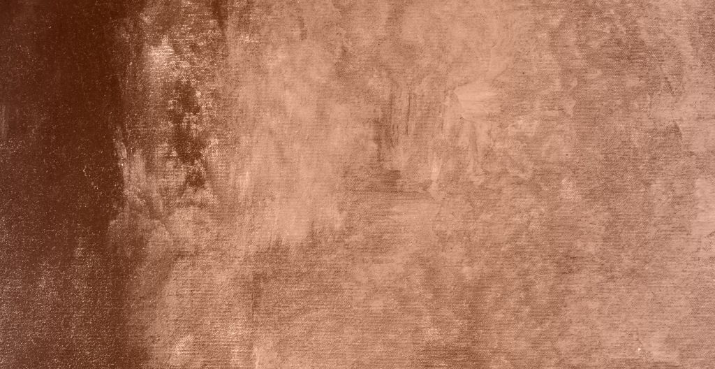 Abstract textured background in warm brown tones.